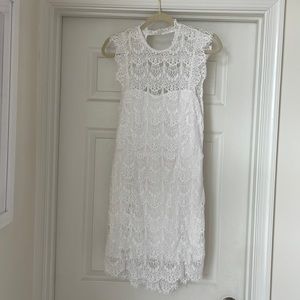 NEW with tags! White lace Free People dress. Size large.